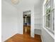 Corner office featuring a built-in bookcase and ample natural light at 3234 Cypress Grove Dr, Eustis, FL 32736