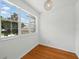 Bright office space with a window offering natural light and hardwood floors at 3234 Cypress Grove Dr, Eustis, FL 32736