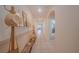 Inviting hallway featuring tile floors, neutral walls, and decor for a welcoming atmosphere at 3719 Holly Grove Ln, Mount Dora, FL 32757