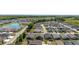 Extensive aerial view of a planned residential community with homes surrounding lakes and green spaces at 3786 Stephanie Way, The Villages, FL 32163