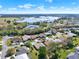 Panoramic aerial view of a residential neighborhood near a lake and a scenic landscape at 5645 Huntington St, Leesburg, FL 34748