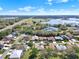 Extensive aerial view of a residential neighborhood near a highway, wetlands and open pasture at 5645 Huntington St, Leesburg, FL 34748