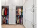 Spacious walk-in closet with ample storage space and custom shelving at 5835 Hensley Ave, The Villages, FL 32163