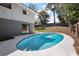 Relaxing in-ground pool surrounded by a concrete patio at 603 N Lakeshore Blvd, Howey In The Hills, FL 34737