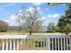 Beautiful view of the water and landscape from the balcony at 603 N Lakeshore Blvd, Howey In The Hills, FL 34737