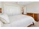 Bedroom featuring bright natural light, carpet, and closet at 6088 Keckonen Dr, The Villages, FL 32163