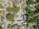 Bird's eye view of the property showing the roof, backyard, and neighborhood layout at 11414 Layton St, Leesburg, FL 34788