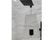 Detailed view of the shower features elegant marble tiling and sleek, matte black fixtures at 12412 Sw 98Th St, Dunnellon, FL 34432