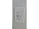 Close-up of an installed electrical wall outlet with USB ports for convenient device charging at 12412 Sw 98Th St, Dunnellon, FL 34432