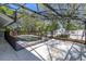 Pool view from patio showing screened in enclosure at 12815 Katherine Cir, Clermont, FL 34711