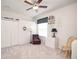 Bedroom with vaulted ceiling, ceiling fan, closet, and natural light at 13131 Sandy Pine Ln, Clermont, FL 34711