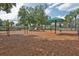 Community playground area with swings and slides for outdoor fun at 13131 Sandy Pine Ln, Clermont, FL 34711