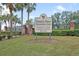 Greater Pines recreation area sign showing the pool, tennis court and tot lot at 13131 Sandy Pine Ln, Clermont, FL 34711