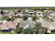 Neighborhood aerial view showcasing well-maintained homes and landscaping in a desirable community at 1419 Segovia Pl, The Villages, FL 32162