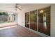 Screened-in porch with tile flooring and sliding glass doors leading inside at 1419 Segovia Pl, The Villages, FL 32162