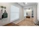 Bedroom featuring a closet with mirrored doors at 16109 Hillside Cir, Montverde, FL 34756