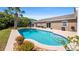 Sparkling pool with a sun-drenched patio, great for outdoor relaxation and entertaining in style at 16109 Hillside Cir, Montverde, FL 34756