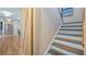 Hallway with view of stairs and sliding barn door at 16109 Hillside Cir, Montverde, FL 34756