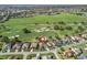 A high angle view of a home on the golf course in a scenic suburban neighborhood at 1726 Augustine Dr, The Villages, FL 32159