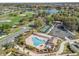 Aerial shot of the community pool and tennis court, showcasing its recreational amenities at 1726 Augustine Dr, Lady Lake, FL 32159