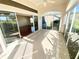 View from the lanai into the living room at 1726 Augustine Dr, The Villages, FL 32159