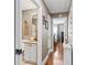 Bright bathroom featuring a granite countertop vanity and decorative accents at 17660 Se 81St Timberwood Ter, The Villages, FL 32162