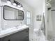 Tastefully renovated bathroom with new vanity and shower stall at 18319 Dells Cove Rd, Groveland, FL 34736