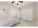 Comfortable bedroom with closet, and tile flooring for easy maintenance and cleaning at 1851 Soaring Heights Cir, Orlando, FL 32837