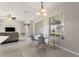 Eating area with tile floors, modern chairs, and natural light at 1851 Soaring Heights Cir, Orlando, FL 32837