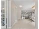 Bright and airy foyer featuring tile flooring, neutral walls, and an open view into the living and dining areas at 1851 Soaring Heights Cir, Orlando, FL 32837