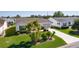 Home with great lawn, landscaped front yard, and driveway; aerial shot at 2008 Cipriano Pl, The Villages, FL 32159