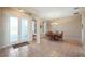 Bright dining room features a classic wood table, chairs, and neutral color palette at 21046 County Road 33, Groveland, FL 34736