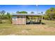 Functional shed with covered space and outdoor area, ideal for projects at 21046 County Road 33, Groveland, FL 34736