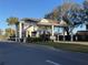 Community entrance with gated access for residents and designated visitor lanes at 24614 Stillridge Ct, Leesburg, FL 34748