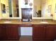 Bathroom with double sink vanity featuring granite countertops, and plenty of storage at 31715 Parkdale Dr, Leesburg, FL 34748