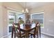 Dining area with table, chairs, and sliding glass doors to the backyard at 3334 Pierluissi Path, The Villages, FL 32163