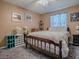 Inviting bedroom featuring neutral walls, ceiling fan, and plush gray carpeting at 337 Olanta Dr, The Villages, FL 32162