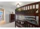 Bedroom featuring bunk beds, light fixture and a dresser in the corner at 410 Majestic Gardens Blvd, Winter Haven, FL 33880