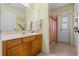 Bathroom featuring a sink and a shower with a curtain at 4571 Abaco Dr, Tavares, FL 32778