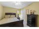 Bedroom featuring carpet flooring, a closet, and furniture at 4571 Abaco Dr, Tavares, FL 32778