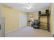 Bedroom with carpet flooring, a closet, and a ceiling fan at 4571 Abaco Dr, Tavares, FL 32778