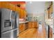 Stylish kitchen with stainless steel refrigerator and ample counter space at 4571 Abaco Dr, Tavares, FL 32778