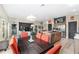 Open living space, view of the kitchen island, dining table, and Gathering room at 5510 Thome Loop, The Villages, FL 32163