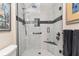 Contemporary walk-in shower with sleek design, including a frameless glass door and a rain shower head at 5510 Thome Loop, The Villages, FL 32163