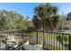 Relaxing balcony showcases seating area and beautiful view at 60 N Park Ave, Winter Garden, FL 34787