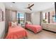 Charming bedroom showcasing two twin beds and modern decor at 60 N Park Ave, Winter Garden, FL 34787