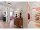 Hallway features eye-catching design leading to colorful bathroom and bedroom at 60 N Park Ave, Winter Garden, FL 34787