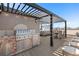 Outdoor kitchen featuring a built-in gas grill on a spacious rooftop terrace at 60 N Park Ave, Winter Garden, FL 34787