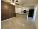 Bright kitchen featuring stainless steel appliances, light gray cabinets and ample counter space at 1000 Royal Oak Blvd, Leesburg, FL 34748