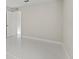 Cozy bedroom with neutral walls and modern white flooring at 11743 Se 174Th Loop, Summerfield, FL 34491